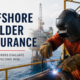 Offshore welder performing structural welding on an offshore oil platform during marine maintenance